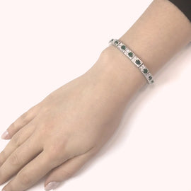 Zambian Oval Cut Emeralds 6.38 Carat Diamond Platinum Bracelet